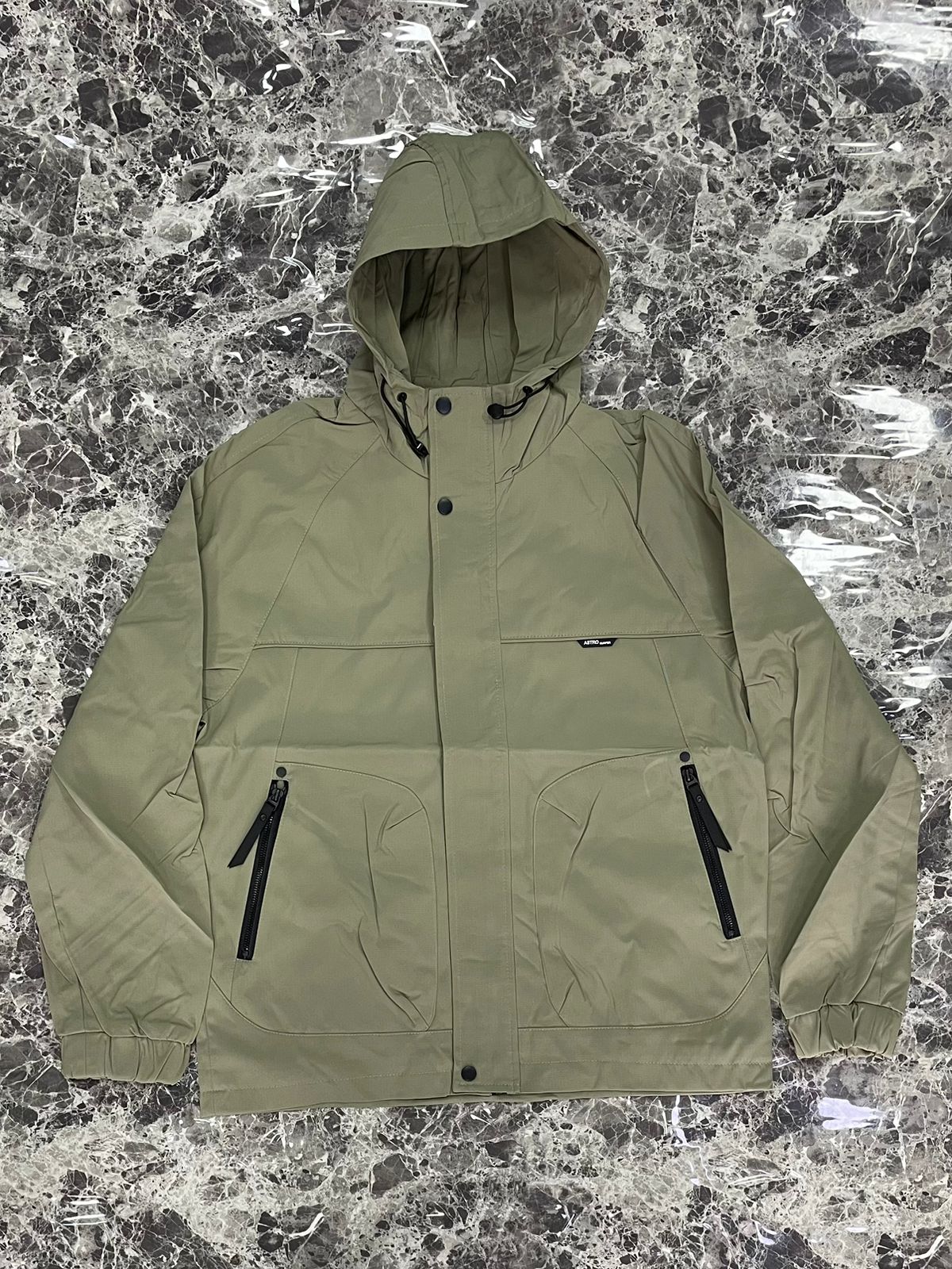 CHOMPA IMPERMEABLE ASTRO