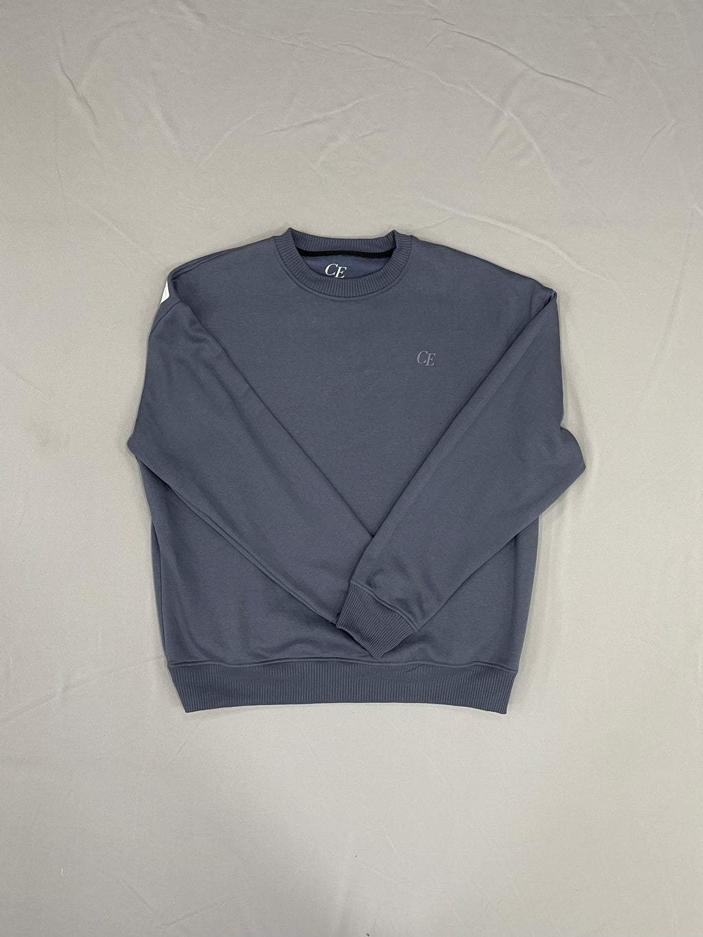 SUDADERA SIN CAPUCHA OVERSIZE CE AZUL