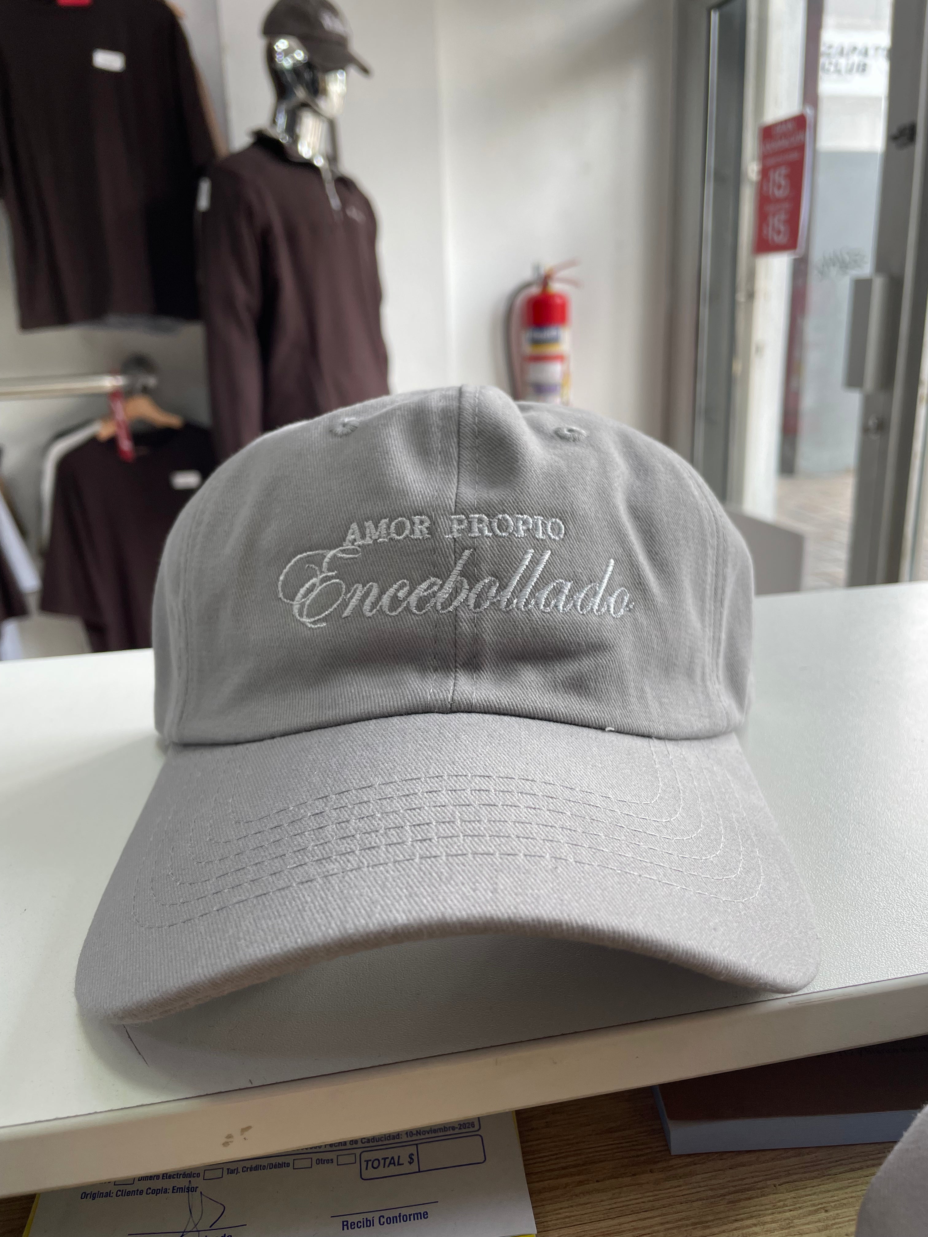GORRA “AMOR PROPIO ENCEBOLLADO”