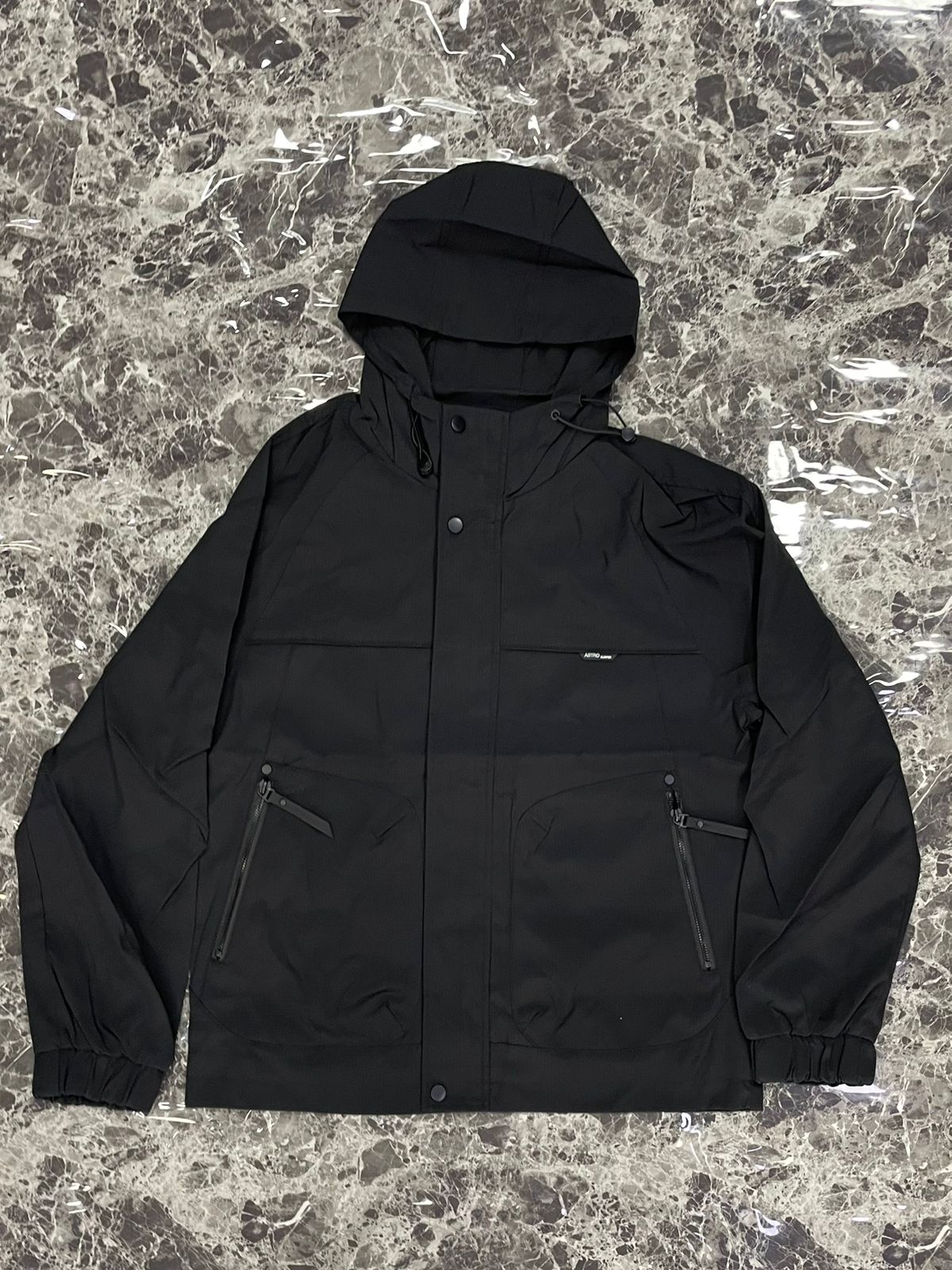 CHOMPA IMPERMEABLE ASTRO