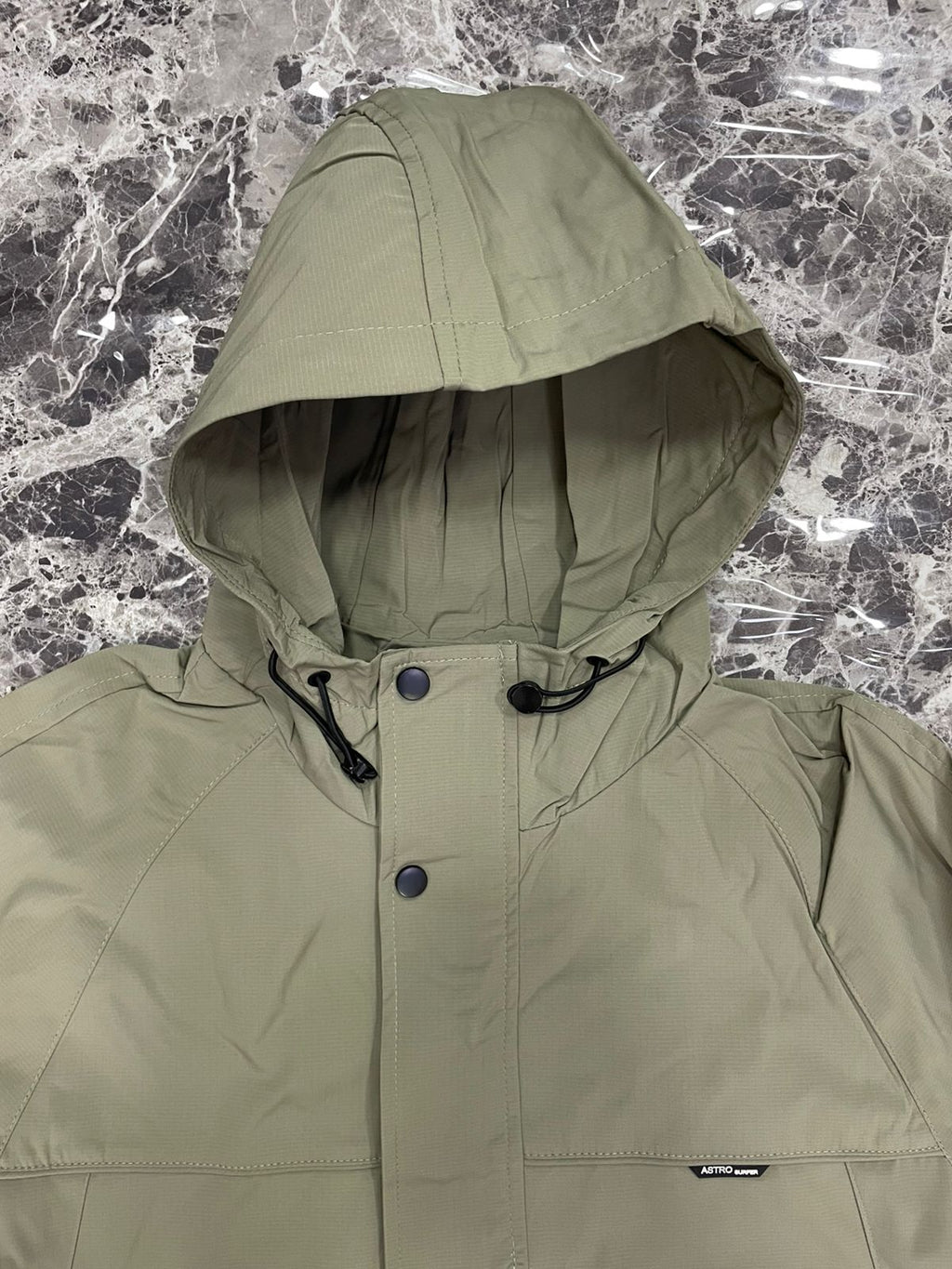 CHOMPA IMPERMEABLE ASTRO