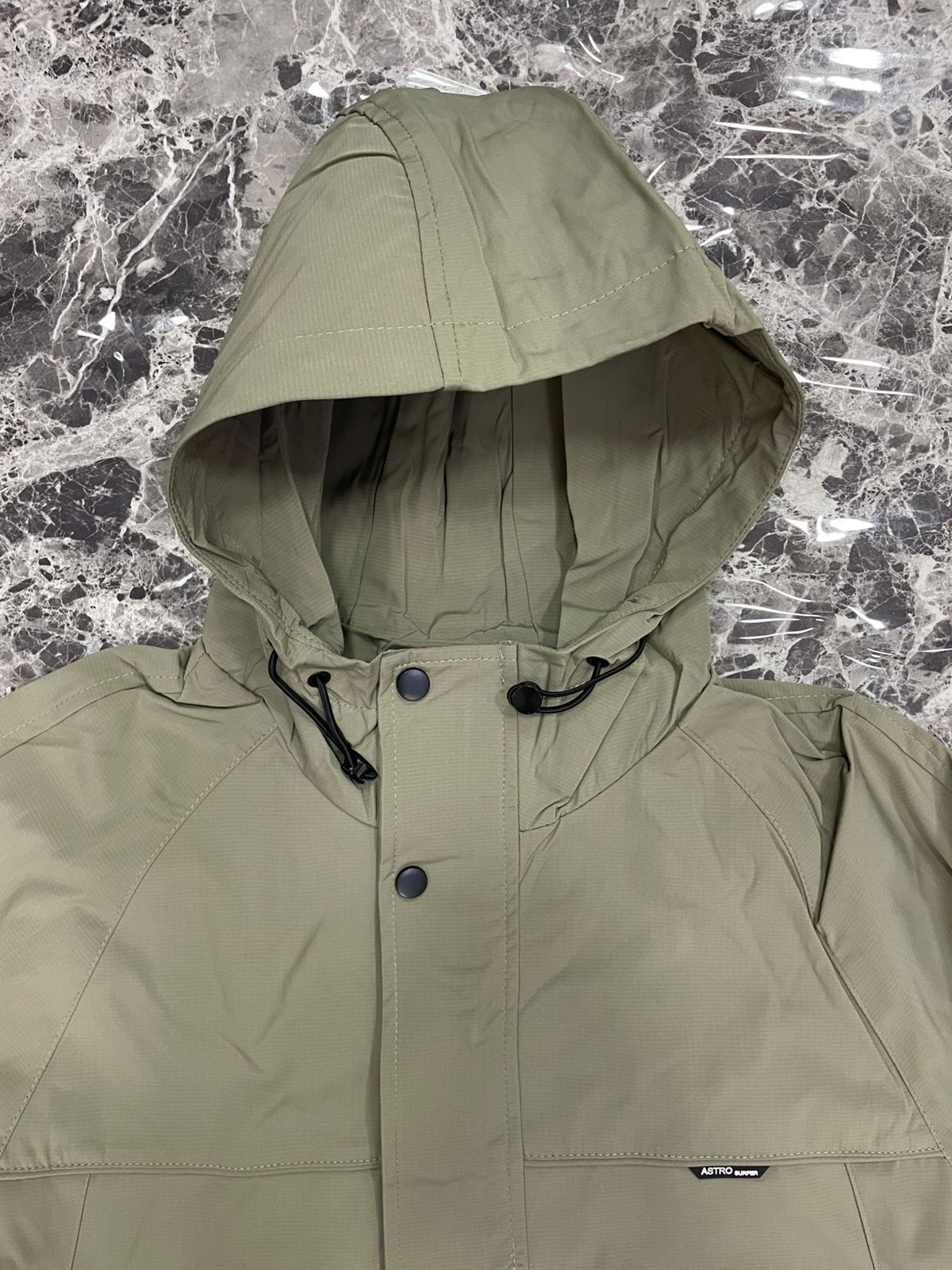 CHOMPA IMPERMEABLE ASTRO